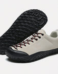 Dannto beige Veld II Pro - Men's and Women's Lightweight Barefoot Shoes shown from a three quarter view and the bottom