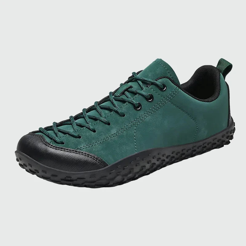Dannto green barefoot trail shoes shown from a three quarter view