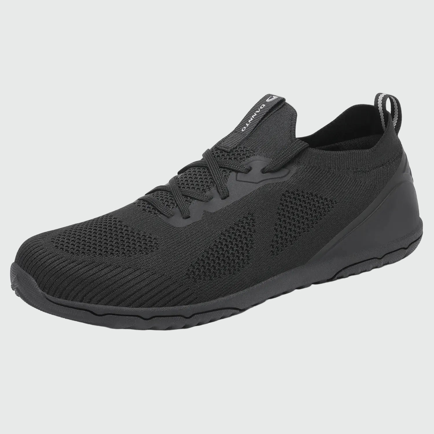 Dannto black zero drop barefoot sneakers shown from a three quarter view