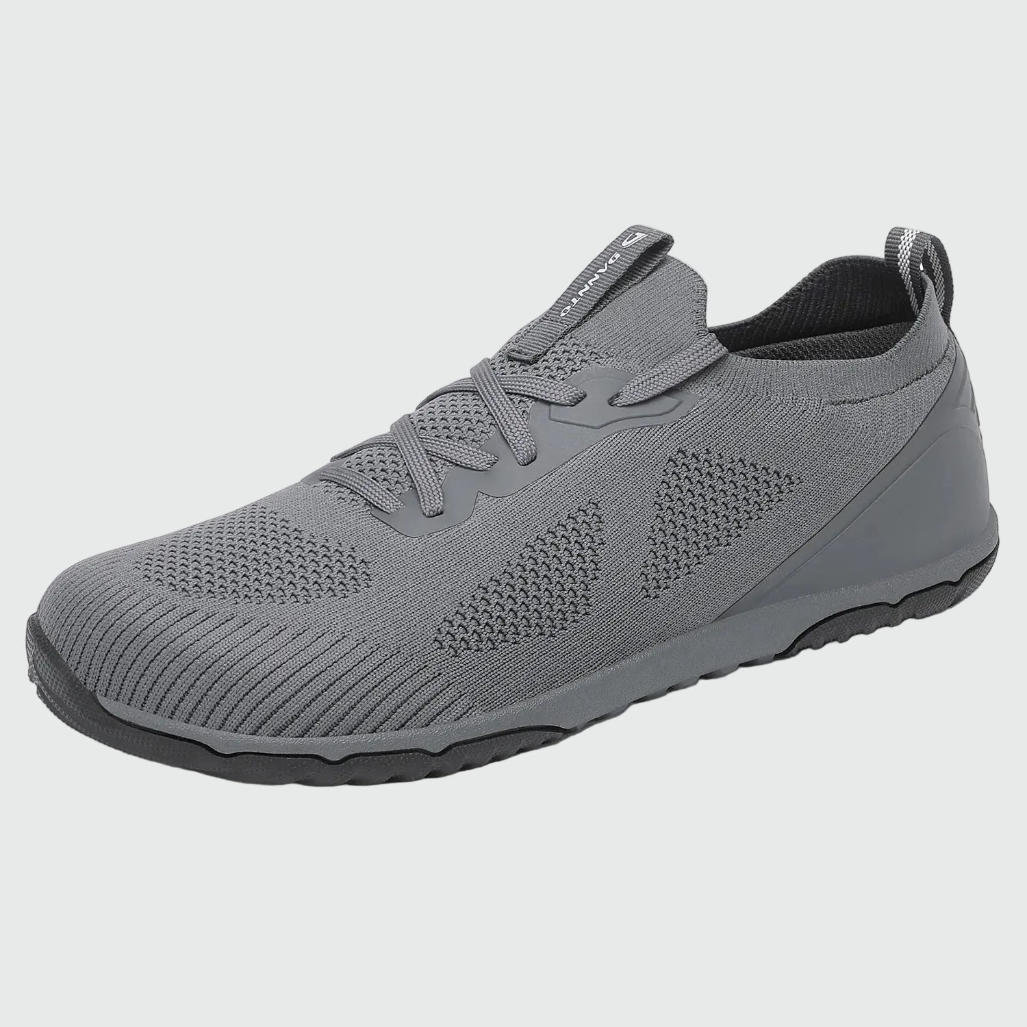 Dannto dark gray zero drop barefoot sneakers shown from a three quarter view