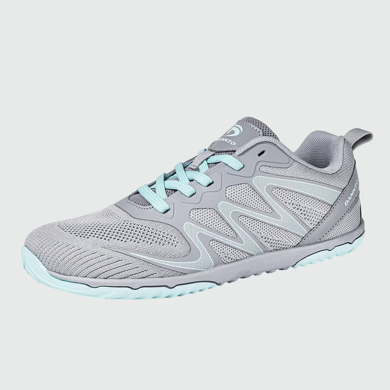 Gliss II - gray wide toe box barefoot shoes for women shown from a three quarter view